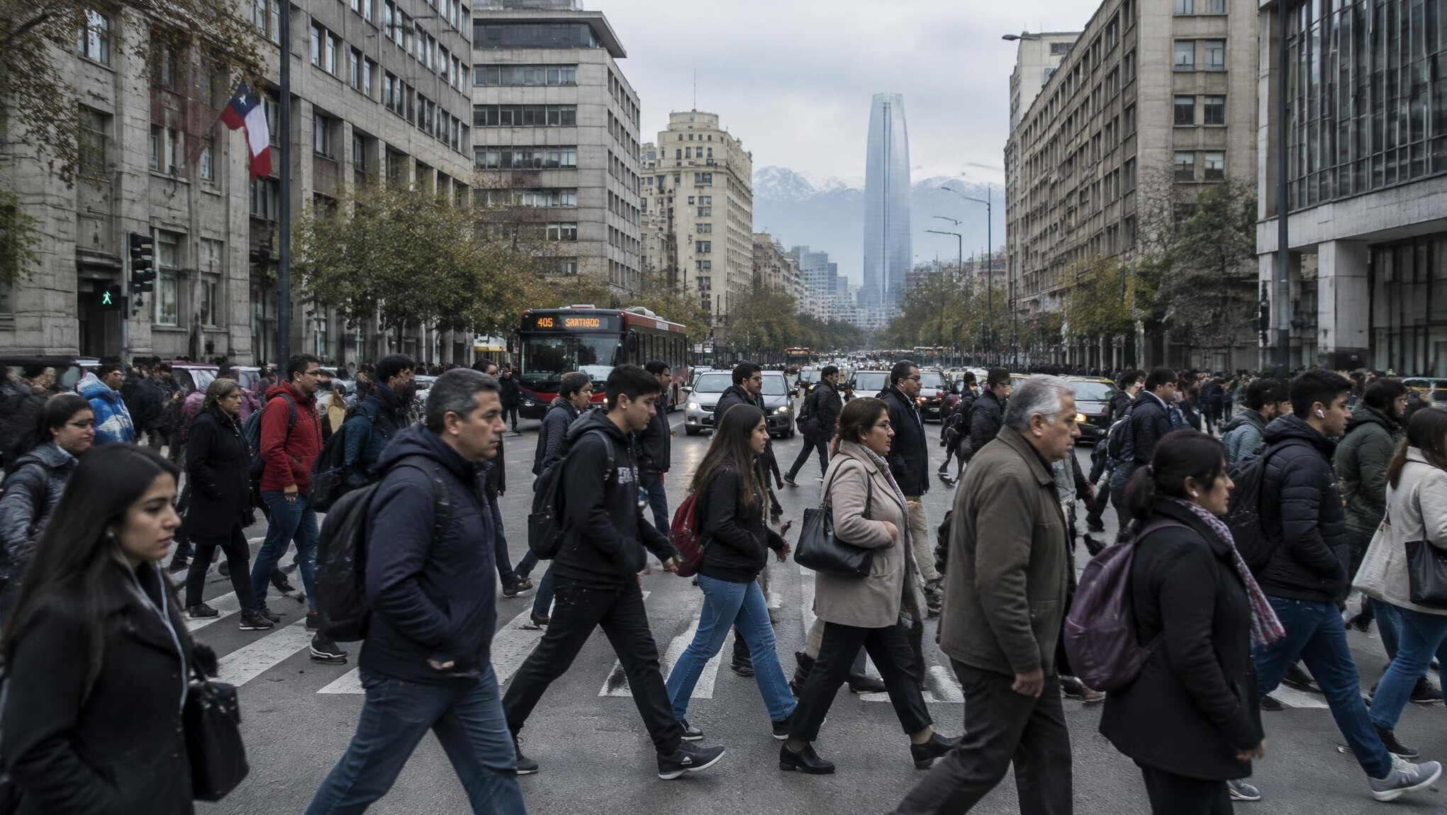 Pedestrians crossing a busy street in downtown Santiago, Chile