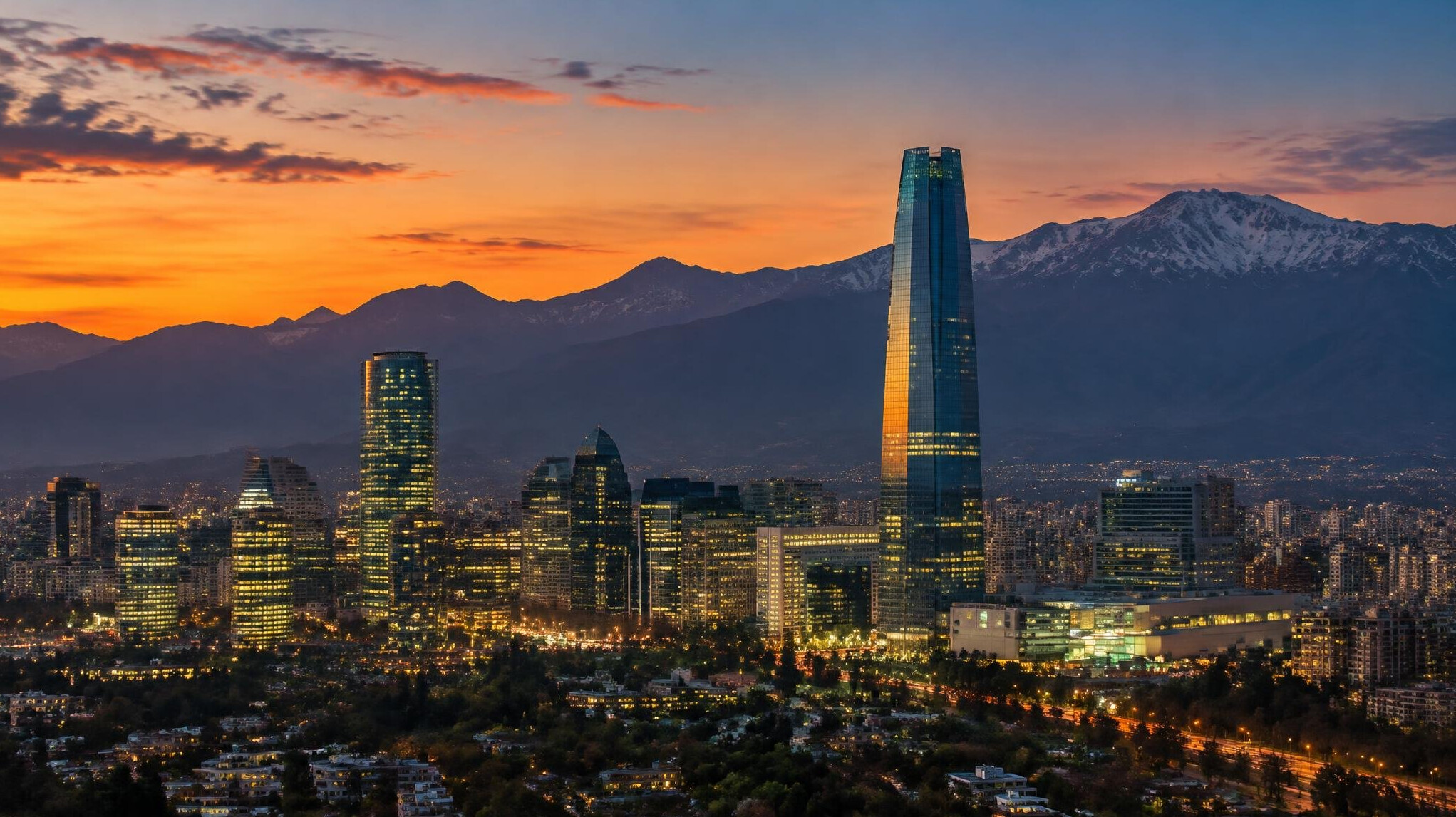 Santiago city skyline at dusk with the Andes mountains in the background