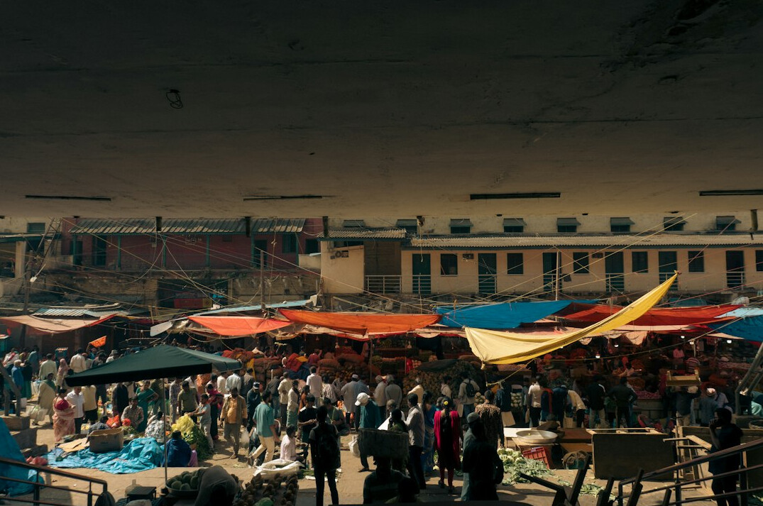 elderly man walking in city
